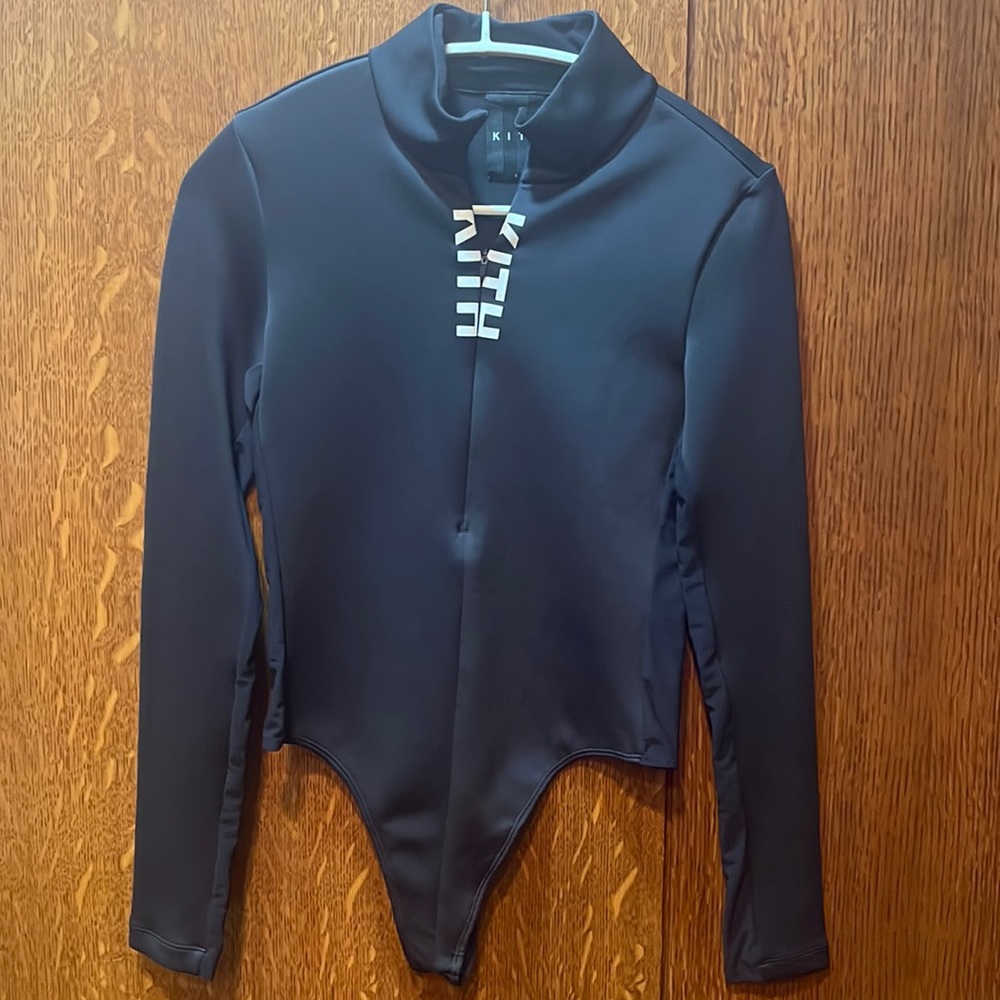 Kith bodysuit worn once.. fabric is a light scuba very flattering!